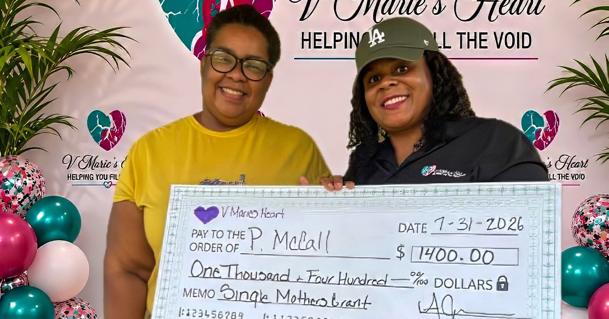 V Marie’s Heart presents a $1,400 Single Mothers Grant to a grant recipient
